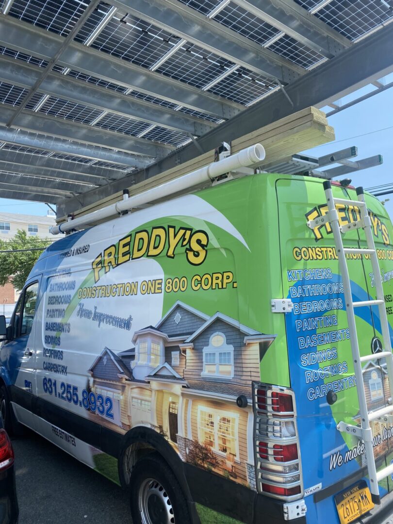 A van with a solar panel on the side of it.