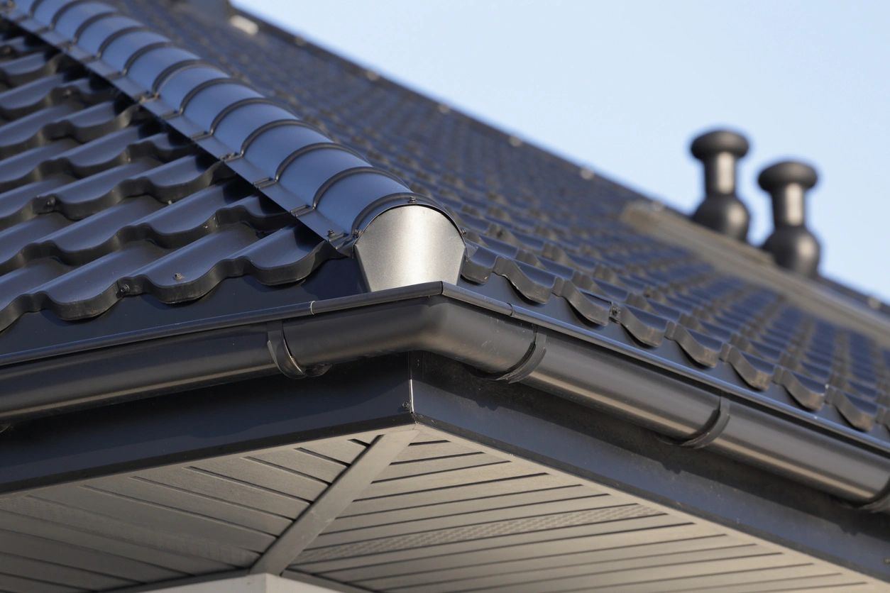 A close up of the gutter on a house